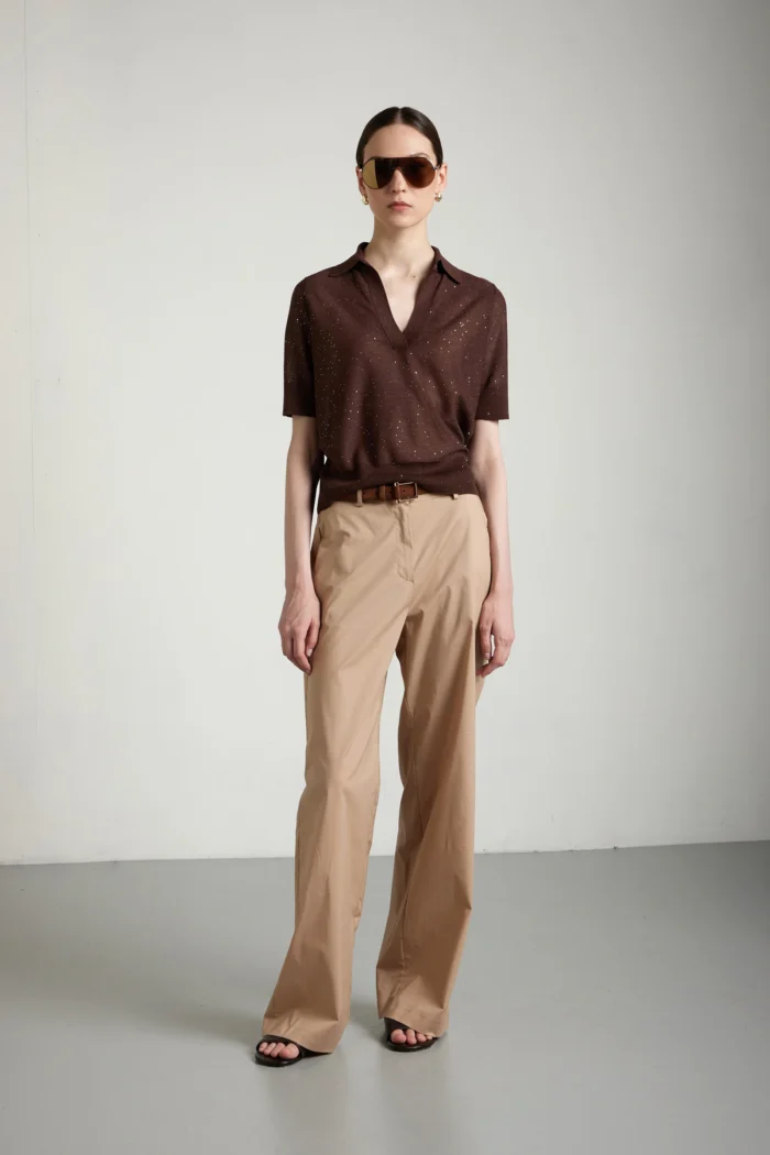 Polo con manica a tre quarti e micropaillettes